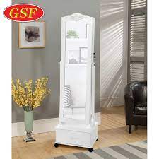 Offers large storage capacity with 3 compartments, 6 storage bags, 48 ring holes, 60 earring slots, 18 stud holes, and 12 necklace hooks. Furniture Free Standing Mirror Jewelry Armoir Wooden Jewelry Storage With Full Length Dressing Mirror Buy Wooden Jewelry Storage Furniture Free Standing Mirror Jewelry Armoire Jewelry Storage Product On Alibaba Com