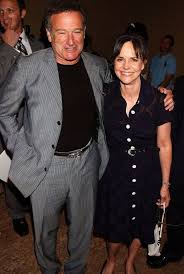 Robin Williams and Sally Field. During the filming of *Mrs. Doubtfire*, Sally  Field received a phone call telling her that her father had passed away. Robin  Williams sensed that something was amiss,