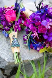 As an ornament, you can choose violet and purple ribbons, balloons. Baroque Style Enchanted Outdoor Garden Peacock Inspired Wedding Purple Wedding Flowers Purple Wedding Flowers Centerpieces Boutonniere Wedding Fall
