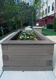 It is just like a huge wooden box that sits on lovely wooden legs. Building Elevated Planter Boxes For Easier Gardening Countryside