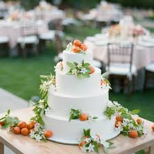 Kumquat Orange Blossom Wedding Cake Wedding Floral Decor By Lmd Lewis Miller Designs Photo By Amy Orange Blossom Wedding Citrus Wedding Cool Wedding Cakes