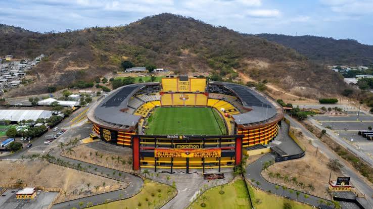 Large football stadium reference illustrating high-capacity event conditions that rapidly expose sensor faucet reliability problems