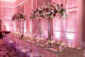 Giant Floral Centerpieces Blush And Burgundy In This Ballroom Complimented With Gol Blush Wedding Centerpieces Uplighting Wedding Elegant Wedding Centerpiece