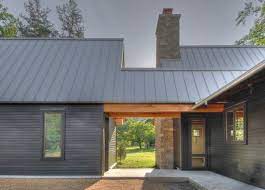 transitional exterior by hefferlin kronenberg architects metal roofing low maintenance a crisp modern farmhouse exterior exterior design farmhouse exterior