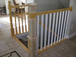 I removed this moulding, as we were about to install the new flooring and soon discovered that all of the spindles could be removed from the railing. Remodelaholic Stair Banister Renovation Using Existing Newel Post And Handrail Diy Stairs Stairs Diy Renovation Banister Remodel