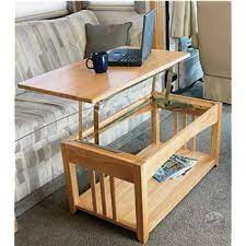 The coffee table makes a handy traditional table for in front of the couch and quickly converts into a workspace for projects, a place for a laptop, or even the reviews from others who own this rv coffee table are very positive which is uncommon for furniture in general. Pin By Scentzbyrichonda On It S My Rv Life Coffee Table Furniture Camper Decor