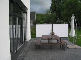 Praktische Sichtschutz Und Windschutzwand Fur Den Garten Outdoor Dekorationen Markise Gartengestaltung
