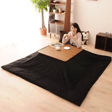Get Through The Cold Winter With A Kotatsu This Kawaii Japanese Invention Is Basically A Mix Between A Blanket A Table And A Heater Once Y Japanese Inventions
