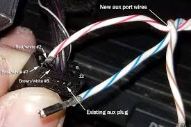 Once the connections are made, slide the stereo back in and connect to the wiring harness. Bmw Auxiliary Port Installation E60 5 Series All Models