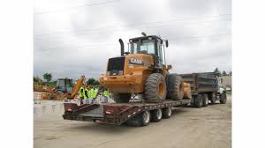 What To Know Before Using A Dump Truck To Tow Equipment