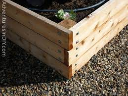 Construct a frame for your bed with durable wood planks and fill it up with vegetables or flowers. Raised Garden Beds Vegetable Garden Raised Beds Raised Garden Raised Garden Beds Diy