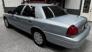 Image result for Light Ice Blue 2007 Crown Victoria