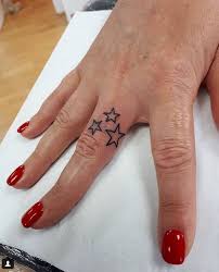 A pair of black designs are depicted on the wearers' ring fingers in this tattoo set that replaces traditional wedding rings. Pin On Tatts