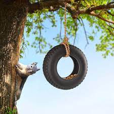 I love love love this bird feeder. Amazon Com Genuine Fred Swing Time Tire Swing Bird Feeder 5132177 Home Kitchen