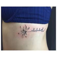 In Loving Memory Of A Little Angel Thank You Emilie Angel L Ultrasound Heartbeat Flowertattoo Flowe Daisy Tattoo Designs Tattoos Memorial Tattoos