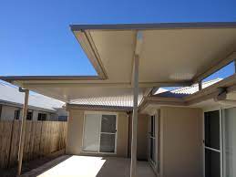 Stratco Cooldek Fly Over Patio That Was Built To Provide Cover For An Outdoor Area And To Prevent Glare Into The House Carport Patio Pergola Patio Roof