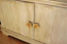 Use 120 grit sandpaper to lightly sand the cabinets. How To Distress Furniture How Tos Diy
