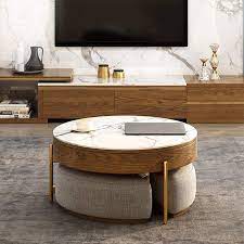 Accent your living room with a coffee, console, sofa or end table. This Space Saving Coffee Table Has Three Cushion Seats And A Pull Out Desk