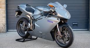 The f4 was created by motorcycle designer massimo tamburini at crc (cagiva research center), following his work on the ducati 916. 1999 Mv Agusta F4 Classic Driver Market