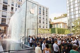Activists in paris ask apple, which the european union alleges owes 13 billion euros in taxes, to give the money back.. Apple Shows Off Photos Of New Piazza Liberty Store In Milan Macrumors