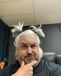 You might have noticed over the course of 2025 that Dan from our sister  station TMFM's hair has grown quite a lot, a far cry from the clippers or  short back and