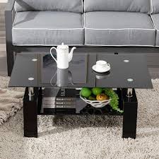 If different furniture or decor is functioning as the statement piece in the living room, go with a minimalist coffee table instead. Black Glass Coffee Table With 2 Tier Tempered Glass Boards Modern Side Center Coffee Table With Lower Shelf Wooden Legs Sturdy Rectangle Sofa Side Tables Cocktail Living Room Furniture Q14338 Walmart Com