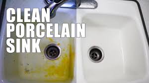Use a little dish soap and hot water for easy cleanups or bring out the baking soda to buff away scratches and white vinegar to remove tough stains. How To Clean Porcelain Sink What Cleaned This Old Sink The Best Youtube