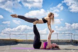 Cutest girls of russian federation are streaming this very minute! Two Girls Are Engaged In Acro Yoga Stock Photo Picture And Royalty Free Image Image 105215574
