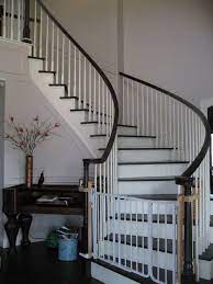 Our Front Curved Stair We Smooth Coated And Added All Moldings Trim Which Makes This Stair Presentab Home Remodeling Curved Staircase Foyer New Home Designs