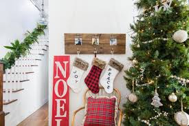 Christmas stocking decorating ideas christmas stocking christmas decorating ideas stocking decorating ideas for a stronger hold add a little glue onto the back of each decoration and let dry. 5 Stocking Display Ideas When You Don T Have A Mantel Hgtv