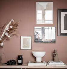 Painting on wall near workplace with wooden mannequin, plant, notebooks, book, cup, vase with wheat and frame. 200 Art Wall Ideas In 2020 Interior House Interior Home Decor