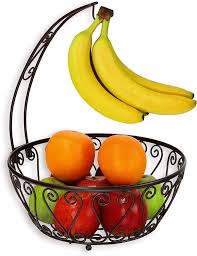 The simple, open design lets you see the fruit in the bowl while allowing good airflow, and the handy banana hanger is visually appealing and saves space. Amazon Com Simplehouseware Fruit Basket Bowl With Banana Tree Hanger Bronze Kitchen Dining