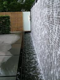 The dining area wall also provides another layer of privacy and sound isolation. Glass Wall Fountain Outdoor Novocom Top