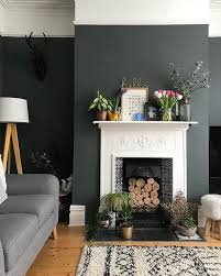 Dark Grey Walls With White Fireplace And Wooden Flooring Living Room Wall Color Vintage Living Room Design Room Wall Colors