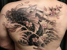 Incredible dragon fish tattoo design. Koi Fish Tattoo Designs Meanings Asian Tattoos