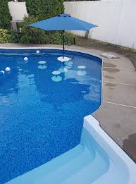 One Of Our Customers Sent This Photo Of His Relaxation Station In His Pool You Can Stay Cool In Cool Swimming Pools Inground Pool Landscaping Pool Landscaping