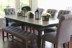 It's rectangular top is made of wide planks of solid reclaimed wood with a distressed finish in brown shades. Rose Co Blog Our 10 Person 35 Dollar Diy Dining Table