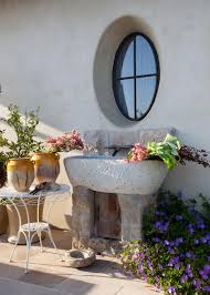 outdoor space with stone garden sink