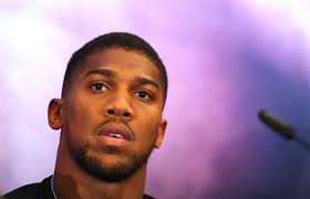 WATCH: Anthony Joshua Loses £10,000 Bet to His Friend