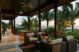 The word lanai is used to describe a covered porch or veranda in tropical locations. What Is A Lanai A Home Feature That Ll Make Your Summer