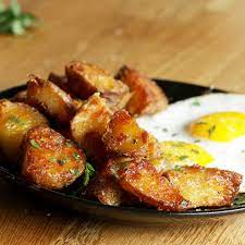 Here S What You Need Russet Potato Baking Soda Salt Olive Oil Garlic Fresh Rosemary Blac Herb Roasted Potatoes Roasted Potato Recipes Vegetarian Recipes