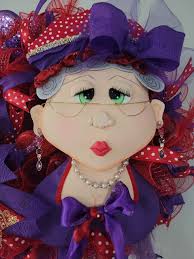 1 of a kind custom handmade lady with wired glasses. Real earrings and  pearl and gold necklace. High end ribbon,and mesh