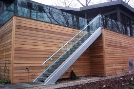 These may be mounted to the floor or wall. Industrial Stair Case With Steel Treads And Railings Industrial Staircase Detroit By Glass Tek Inc Houzz