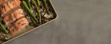 This recipe features the best white cream sauce for salmon! Sheet Pan Meal Salmon With Asparagus Fennel Mushrooms And Lemon Butter South Coast Plaza
