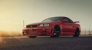 Download this wallpaper vehicles/nissan skyline (1080x1920) for all your phones and tablets. Gtr Nissan R34 Red 1080p Wallpaper Hdwallpaper Desktop Nissan Nissan R34 Gtr