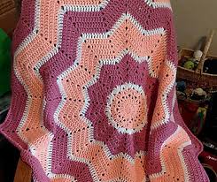 Worsted weight acrylic yarn in desired colors. Free Pattern Lovely Sunburst Round Ripple Baby Blanket Knit And Crochet Daily