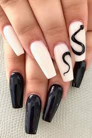 It's such a chic style on nails and because it doesn't have to be perfect to get the look it's easy to diy. Black And White Nail Designs Coffin White Acrylic Nails Acrylic Nails Coffin Short Coffin Nails Designs