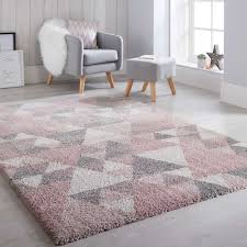 The main colors are pink and grey (such a lovely combination) and you can find many smart design sollutions like a sofa that's also a bookcase and multinfunctional plywood bedroom furniture. Nuru Pink Cream Grey Shaggy Rug Land Of Rugs