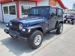 Image result for Patriot Blue 2003 Jeep