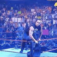 Dwayne johnson's most iconic catchphrase was 'if you smell what the rock is cooking!'. The Rock Entrance Gifs Tenor